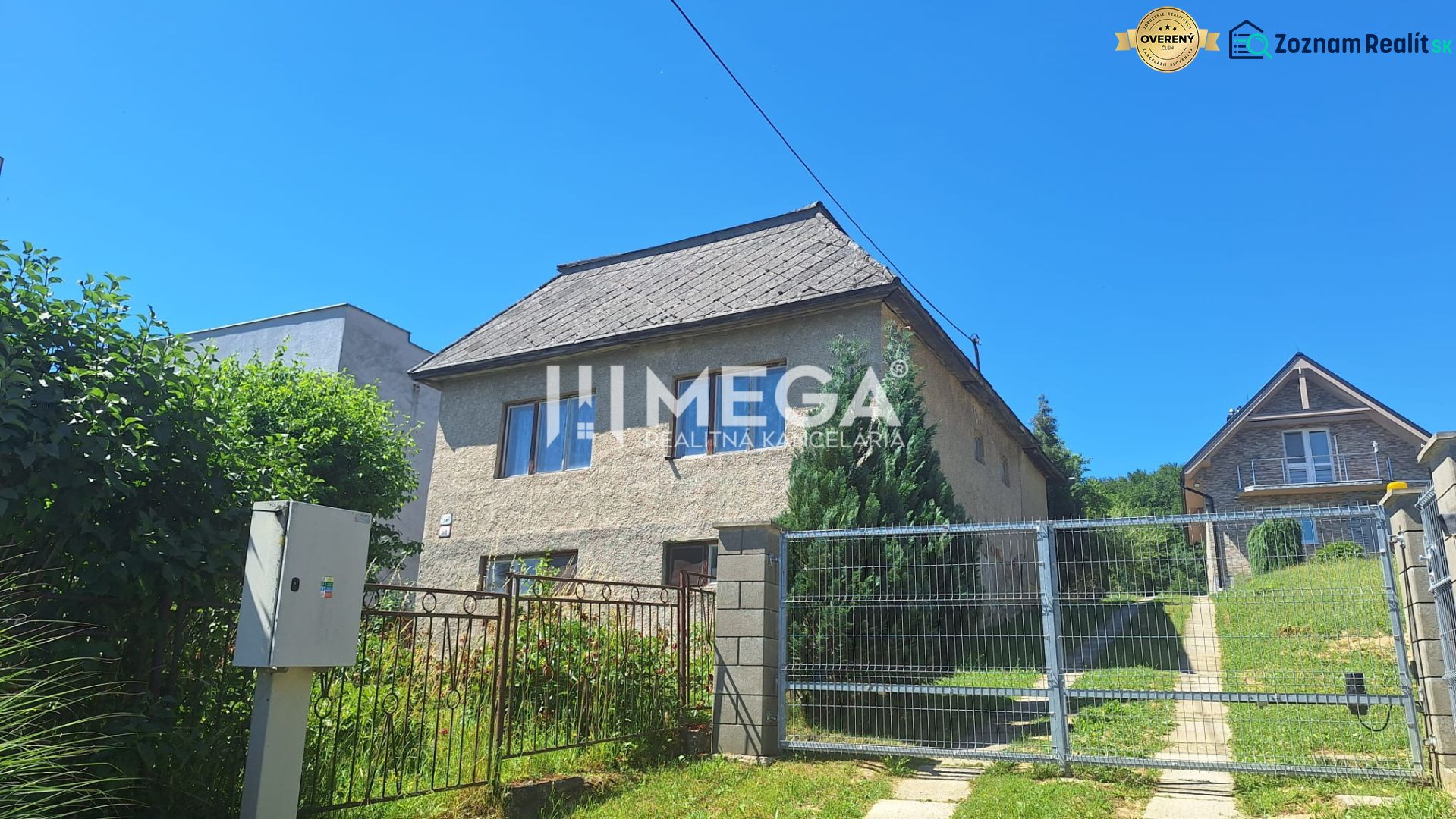 A family house on Jesenského Street in Snina, with a garden and fencing.