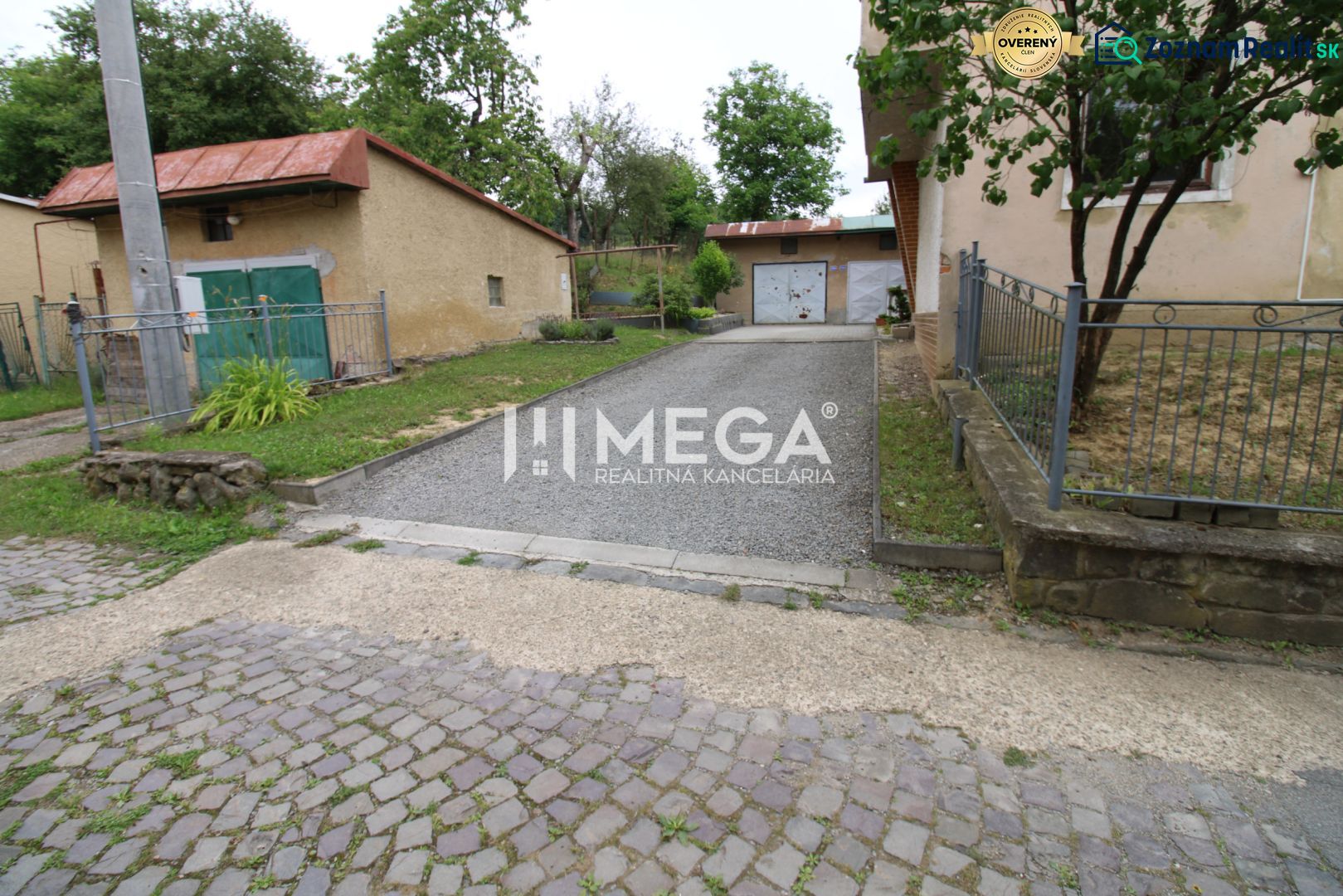 Exterior of a 5 or more room apartment on Gagarinova Street in Snina, with a garage and driveway.