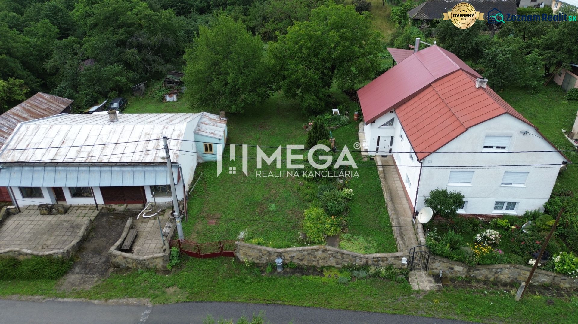 A house with a red roof in Oľšinkov on Oľšinkov Street surrounded by a garden. Plots - residential.