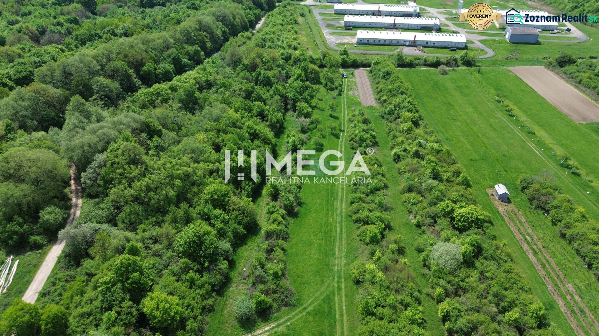 Aerial view of green gardens and forests near Trnava pri Laborci.