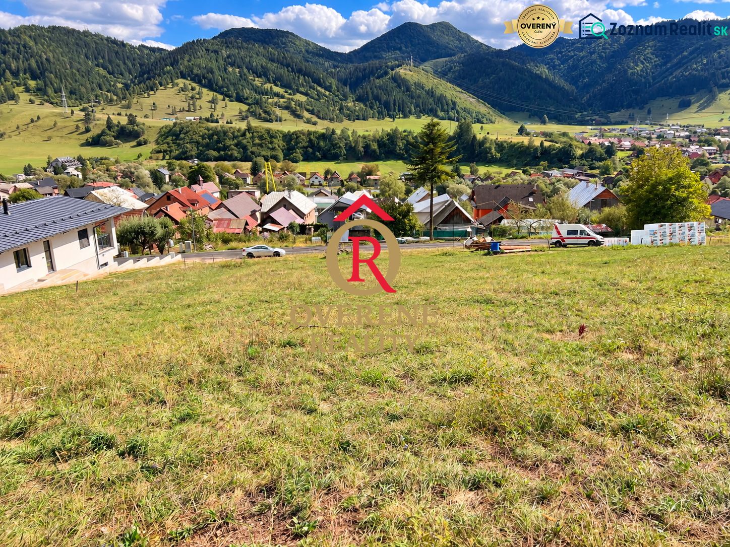 Lands - housing in Švošov, green meadows, houses, hills in the background, ideal for living.