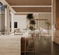 Interior photograph of a modern house with light furniture and large windows. House construction.