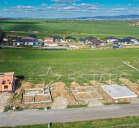 Construction of family houses in Trenčín with a view of the surrounding landscape and greenery.