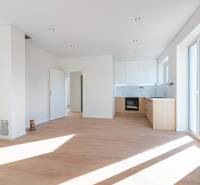 Interior on Bidovce Street in a family house with a bright kitchen and wooden floors.