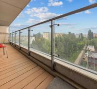 Spacious balcony with a view of greenery and buildings in Bratislava - Ružinov, Nevädzova.