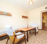 A room with armchairs and a table in a 3-room apartment, a pleasant atmosphere for relaxation.