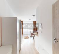 Entrance hallway with a view of the dining area in a 2-room apartment.