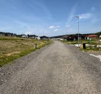 Land - residential area, Gregorovce, with new houses and lamps in the background.