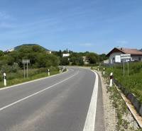A road leading through the village of Gregorovce, suitable for residential plots, surrounded by nature.