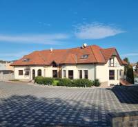 A family house on Dolnočermánska Street in Nitra with a gable roof and a garage.