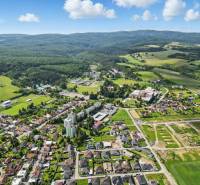 Aerial view of Kováčová, plots - residential area near Slnečná Street, surrounded by nature.