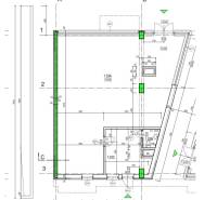 Floor plan of a commercial space with marked walls and entrances.
