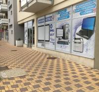 Commercial premises on Štúrova Street in Senec with entrance and advertising display windows.