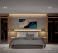 Stylish bedroom in a 3-room apartment with a double bed and built-in wardrobes.