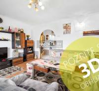 Living room in a 2-room apartment with a cozy interior and comfortable seating.
