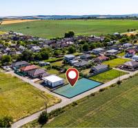 Residential plots in Nižná Kamenica surrounded by nature, with views of forests and fields.