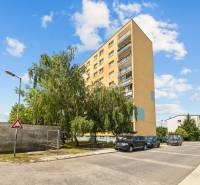 Apartment building on Na pasekách Street, Bratislava - Rača, surrounded by greenery.