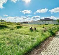 Plots - housing at Južná Brána in Senec with a grassy area and a walkway.