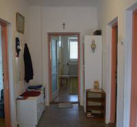 Entrance hall in a family house with furniture and decorations.