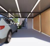 A car parked in a shelter next to a family house in Gaboltov.