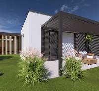 A family house in Gaboltov with a pergola, lawn, and a soccer ball in the garden.