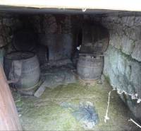 An old cellar space of a family house with barrels in Telkibanya.