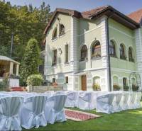 The exterior of the guesthouse Košice - North with a furnished garden, ready for events.