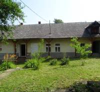 A family house in Tornaszentandrás with a large garden and one attic window.