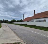 The road in Zemianske Sady next to the building on Zemianske Sady Street, Warehouses and Halls.