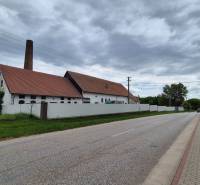 Road by the warehouse buildings in Zemianske Sady, Zemianske Sady Street.