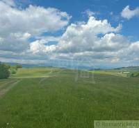 Green meadows under the blue sky in the Gardens near České Brezové.