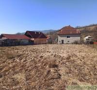 A family house in Nová Sedlica with a grassy plot and surrounding countryside.