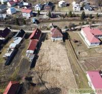 Aerial view of family houses, gardens, and plots in Nová Sedlica.