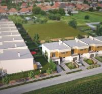 Row housing of family houses in Nové Zámky with parking and garden areas.
