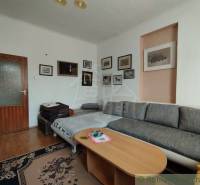 A comfortable living space, sofa and coffee table, decorations, family house.
