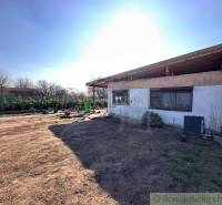 A family house with a large yard and garden, ideal for a peaceful family life.