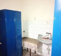 Interior with a blue cabinet, sink, table. A room suitable for a family house.