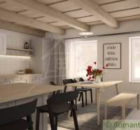 Kitchen and dining area with a wooden ceiling, black chairs, and flowers on the table.