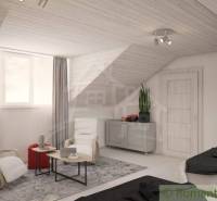 Attic space with two chairs, a table, and decoration in a family house.