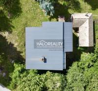 Aerial view of a family house in Nová Baňa surrounded by greenery and nature.