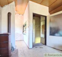 Interior with tiles, open doors, and wooden ceiling in Special Properties.
