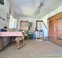 A country kitchen with antique furniture and a stove, Unique properties.