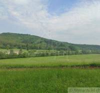 Green meadow, hills, and forests characterize the picturesque landscape of the Family House.