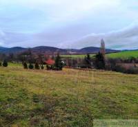 Beautiful landscape with predominant agricultural and forest lands, hills in the background.