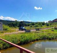 Beautiful nature with a pond, a bridge, and recreational plots, ideal for relaxation.