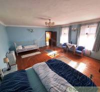 A room in blue color with a bed, properties with a unique interior.