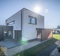 A family house on Tatranská Street in Nová Lesná with a garden and wooden cladding.