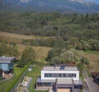A family house on Tatranská Street in Nová Lesná surrounded by nature and mountains.