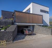 A family house on Tatranská Street in Nová Lesná with an integrated garage and a mountain panorama.