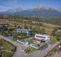 A family house on Tatranská Street in Nová Lesná surrounded by beautiful mountain scenery.